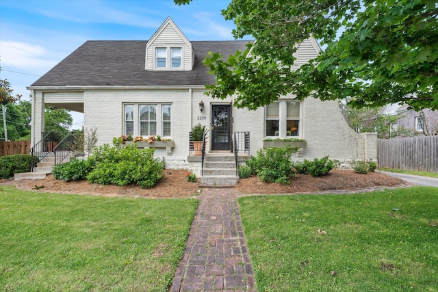 2209 Natchez Trce, Nashville, TN 37212 - cape cod-style house featuring brick siding and a shingled roof