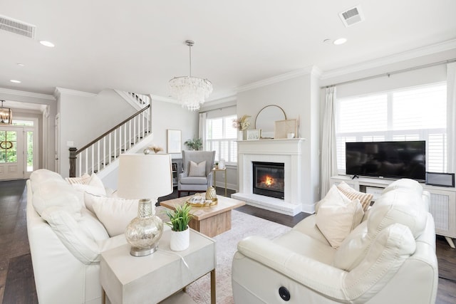 2060 Bushnell Farm Dr, Franklin, TN 37064 - living area with a chandelier, dark wood finished floors, stairs, plenty of natural light, and crown molding