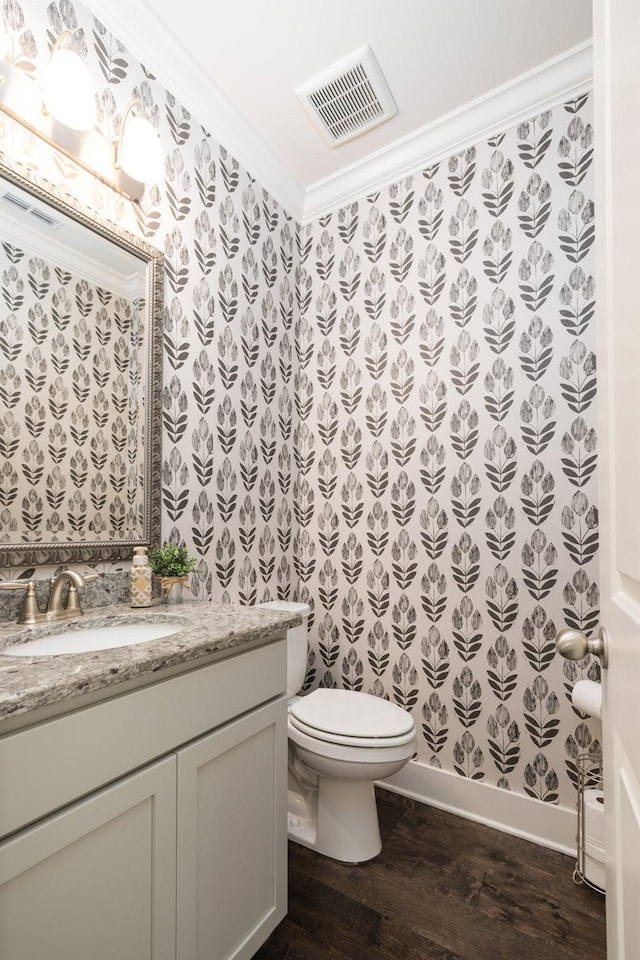 2060 Bushnell Farm Dr, Franklin, TN 37064 - half bath with wood finished floors, wallpapered walls, vanity, baseboards, and toilet