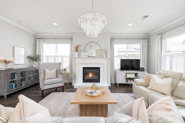 2060 Bushnell Farm Dr, Franklin, TN 37064 - living area with wood finished floors, a glass covered fireplace, ornamental molding, a chandelier, and recessed lighting