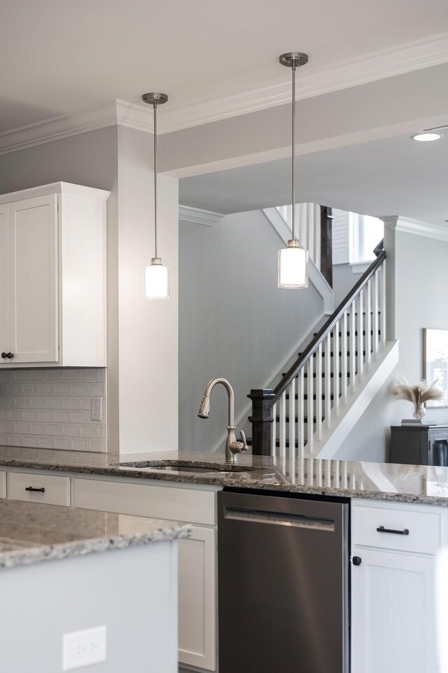 2060 Bushnell Farm Dr, Franklin, TN 37064 - kitchen with dishwasher, ornamental molding, white cabinets, tasteful backsplash, and pendant lighting