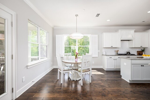 2060 Bushnell Farm Dr, Franklin, TN 37064 - dining area with crown molding, baseboards, dark wood-style flooring, and recessed lighting