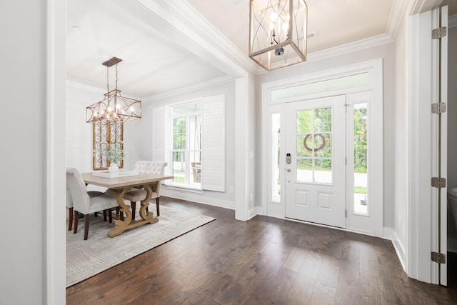 2060 Bushnell Farm Dr, Franklin, TN 37064 - foyer entrance with a chandelier, crown molding, dark wood finished floors, and baseboards