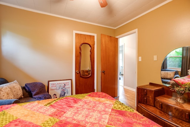 470 Arlington St, Erin, TN 37061 - bedroom featuring wood finished floors, crown molding, and a ceiling fan