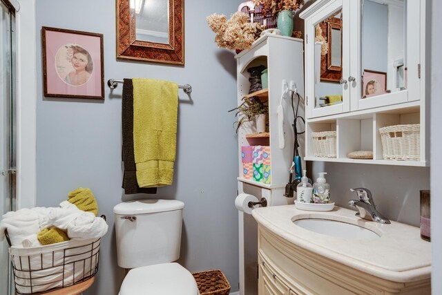 470 Arlington St, Erin, TN 37061 - full bath with toilet, vanity, and a shower with door