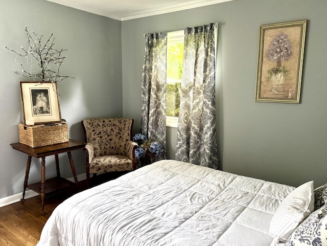470 Arlington St, Erin, TN 37061 - bedroom featuring ornamental molding, wood finished floors, and baseboards
