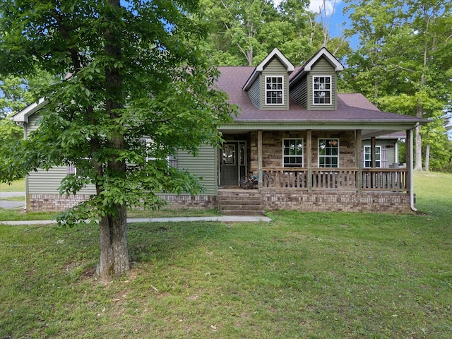 399 Whitaker Cir, Red Boiling Springs, TN 37150 - cape cod home featuring a front lawn, covered porch, stone siding, and a shingled roof