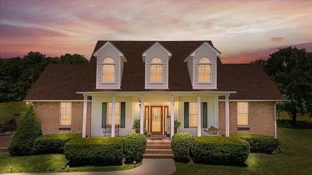 495 Baker Rd, Dickson, TN 37055 - view of front of home with a porch and brick siding