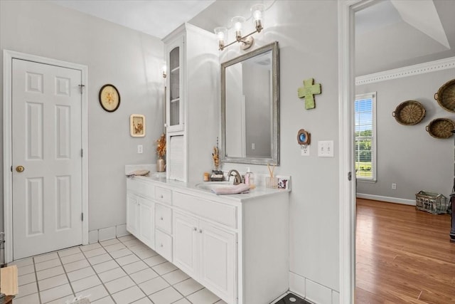 495 Baker Rd, Dickson, TN 37055 - bathroom featuring baseboards, vanity, and wood finished floors