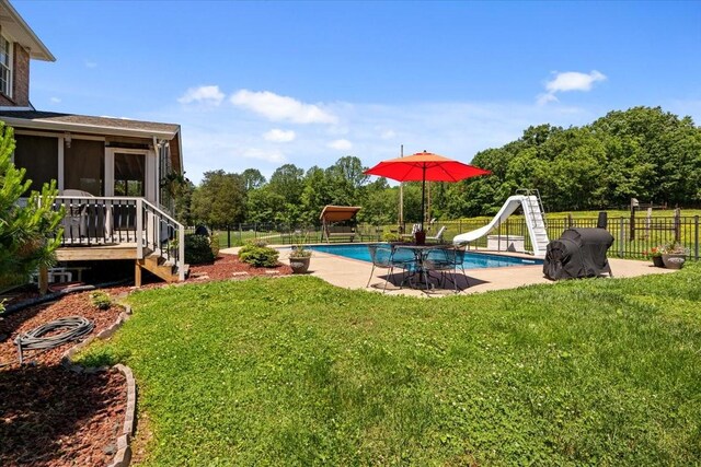 495 Baker Rd, Dickson, TN 37055 - view of yard featuring a sunroom and a deck