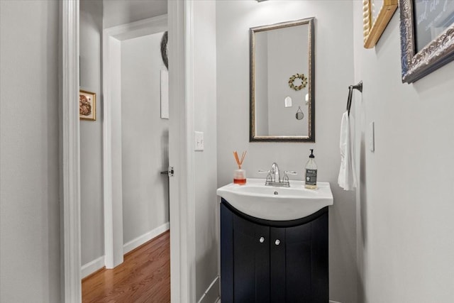 495 Baker Rd, Dickson, TN 37055 - bathroom with vanity, wood finished floors, and baseboards