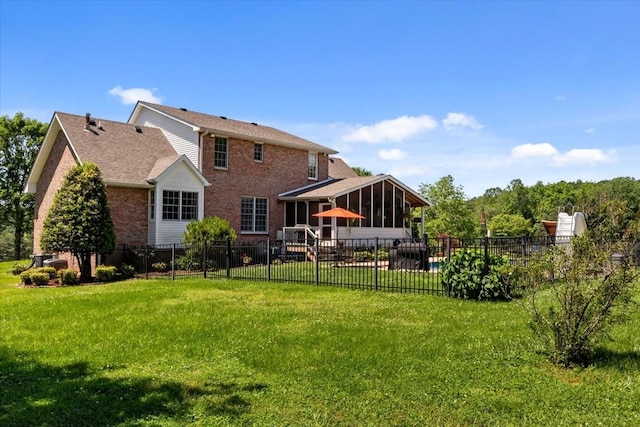 495 Baker Rd, Dickson, TN 37055 - rear view of house featuring a sunroom and brick siding