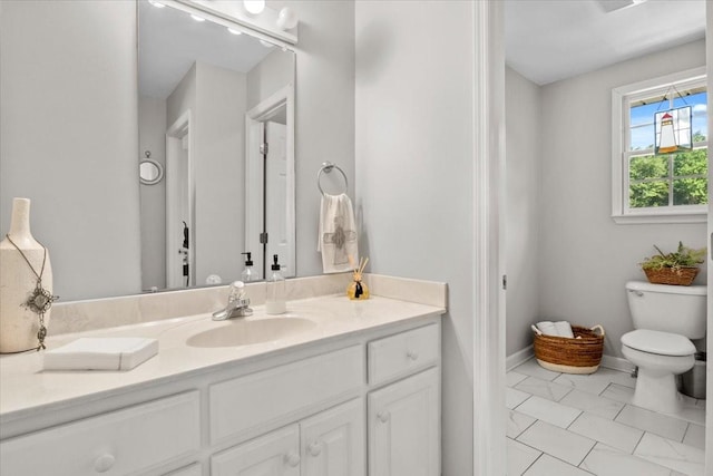 495 Baker Rd, Dickson, TN 37055 - bathroom featuring toilet, vanity, and tile patterned flooring