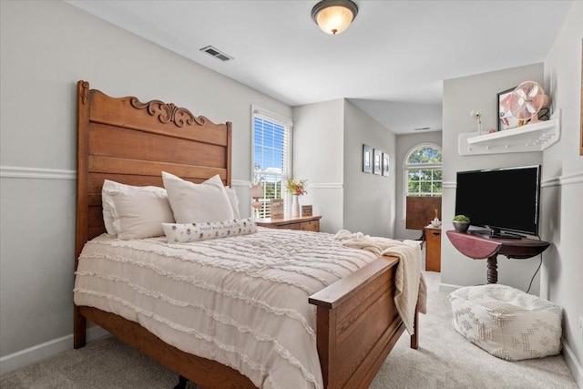 495 Baker Rd, Dickson, TN 37055 - carpeted bedroom with multiple windows and baseboards