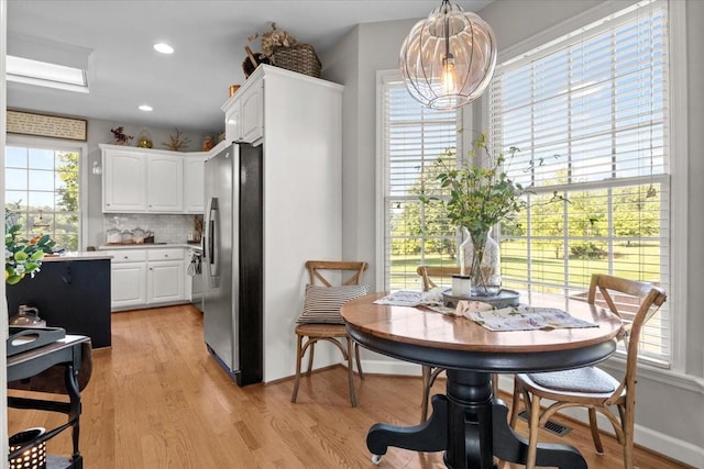 495 Baker Rd, Dickson, TN 37055 - dining room with light wood finished floors, recessed lighting, and baseboards