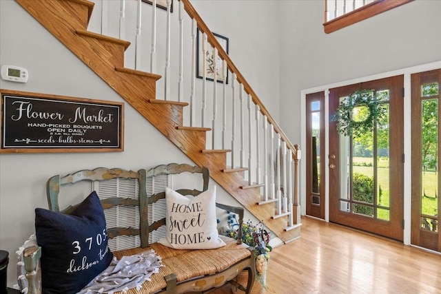 495 Baker Rd, Dickson, TN 37055 - foyer entrance featuring wood finished floors, stairs, and a high ceiling