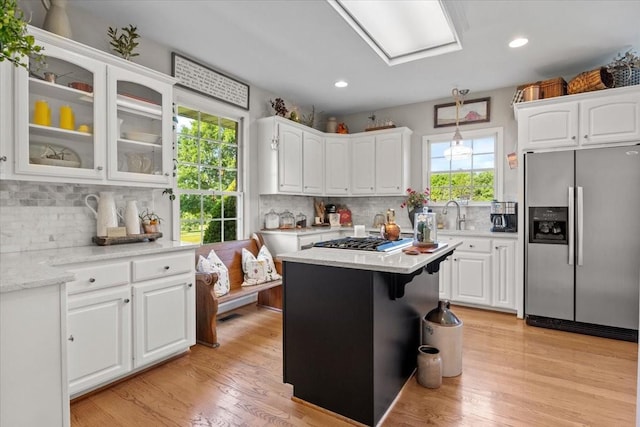 495 Baker Rd, Dickson, TN 37055 - kitchen with appliances with stainless steel finishes, tasteful backsplash, white cabinetry, and recessed lighting