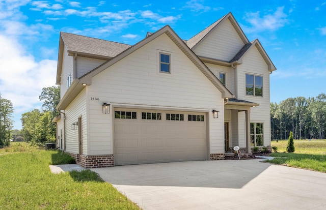 1456 Sango Commons Way, Clarksville, TN 37043 - view of front facade featuring concrete driveway, a garage, and a front yard