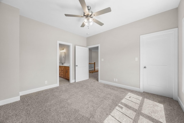 1456 Sango Commons Way, Clarksville, TN 37043 - unfurnished bedroom featuring light colored carpet, baseboards, ensuite bathroom, and a ceiling fan