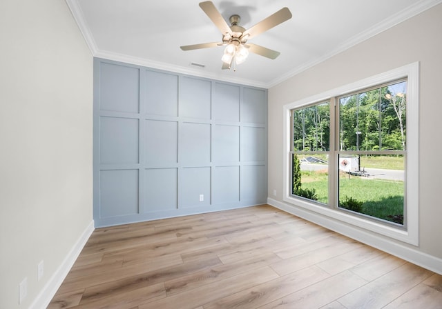 1456 Sango Commons Way, Clarksville, TN 37043 - empty room featuring ornamental molding, light wood-type flooring, a ceiling fan, and baseboards