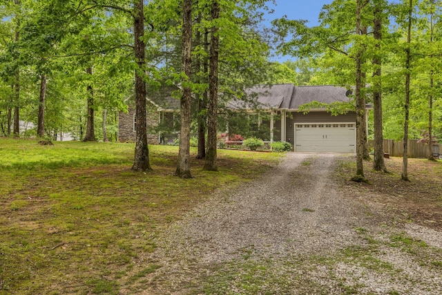 27 Lightning Bug Ln, Sewanee, TN 37375 - view of front facade featuring gravel driveway and an attached garage