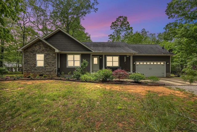 27 Lightning Bug Ln, Sewanee, TN 37375 - view of front facade featuring a garage, concrete driveway, a front lawn, and stone siding