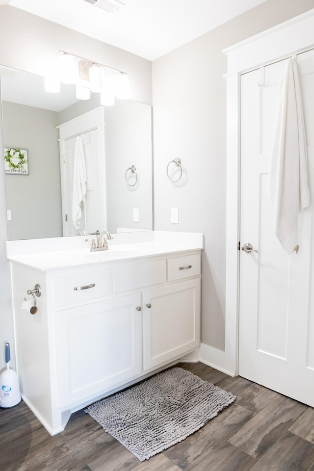3303 Hampton Turner Dr, Murfreesboro, TN 37128 - bathroom featuring wood finished floors, vanity, and baseboards