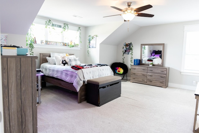 3303 Hampton Turner Dr, Murfreesboro, TN 37128 - carpeted bedroom featuring multiple windows, ceiling fan, vaulted ceiling, and baseboards