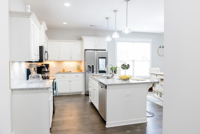 3303 Hampton Turner Dr, Murfreesboro, TN 37128 - kitchen with appliances with stainless steel finishes, a sink, dark wood-style flooring, white cabinets, and recessed lighting