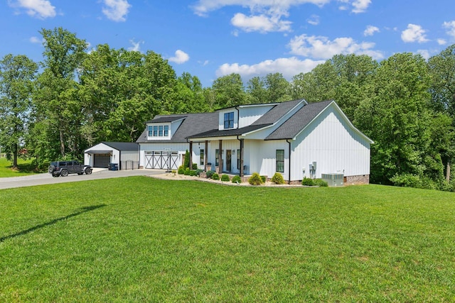 1930 Williams Rd, Lafayette, TN 37083 - modern farmhouse style home featuring driveway, a front lawn, central air condition unit, roof with shingles, and view of scattered trees