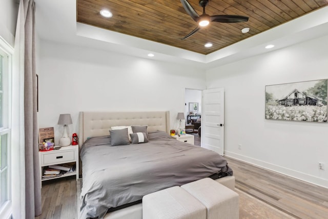 1930 Williams Rd, Lafayette, TN 37083 - bedroom with a tray ceiling, wood ceiling, wood finished floors, baseboards, and recessed lighting