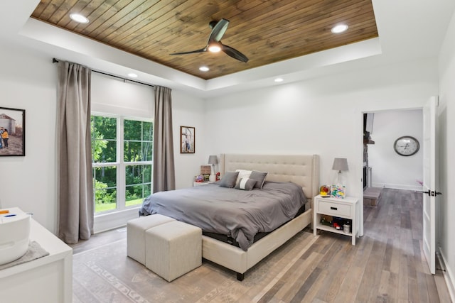 1930 Williams Rd, Lafayette, TN 37083 - bedroom with a tray ceiling, wood ceiling, light wood-type flooring, a ceiling fan, and recessed lighting