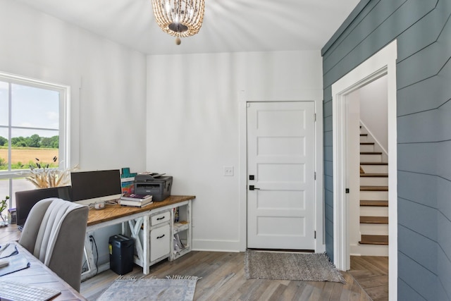 1930 Williams Rd, Lafayette, TN 37083 - home office with a chandelier, wood finished floors, and baseboards