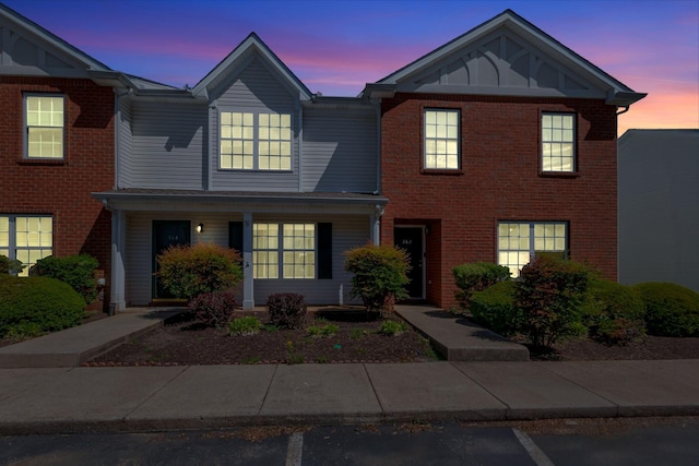 362 Shoshone Pl, Murfreesboro, TN 37128 - view of front facade with a porch and brick siding