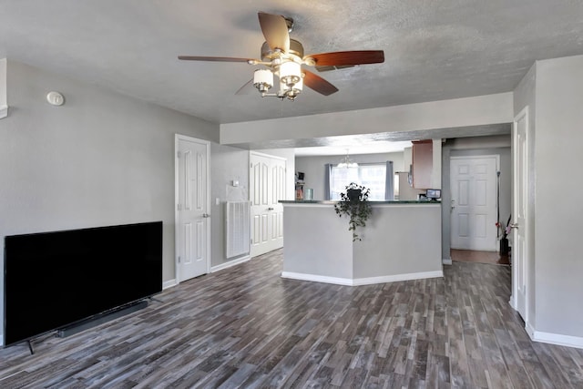 362 Shoshone Pl, Murfreesboro, TN 37128 - unfurnished living room with dark wood finished floors, baseboards, and ceiling fan