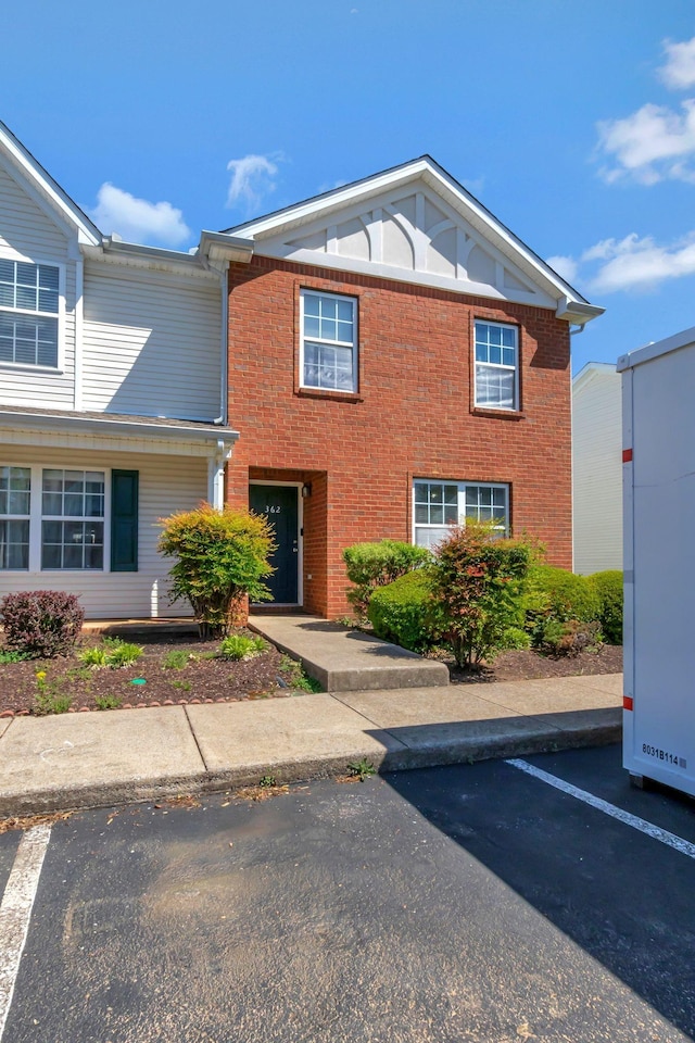 362 Shoshone Pl, Murfreesboro, TN 37128 - view of front of home featuring uncovered parking and brick siding
