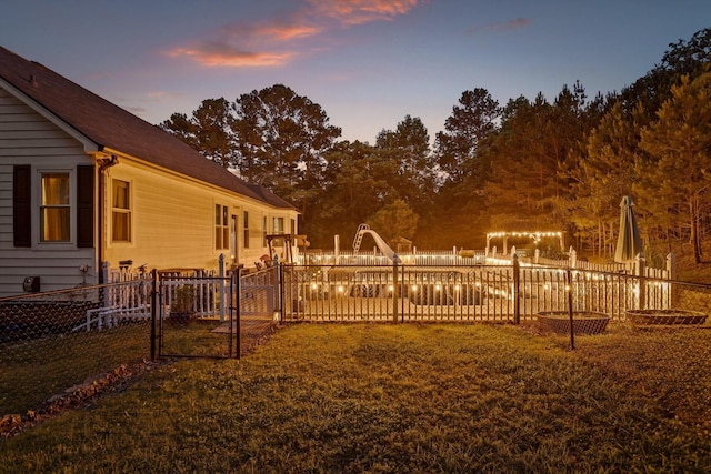 view of yard with a gate