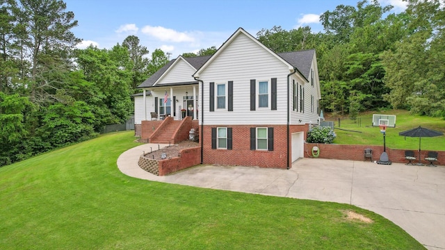 view of front of property with driveway, stairs, an attached garage, a front yard, and brick siding
