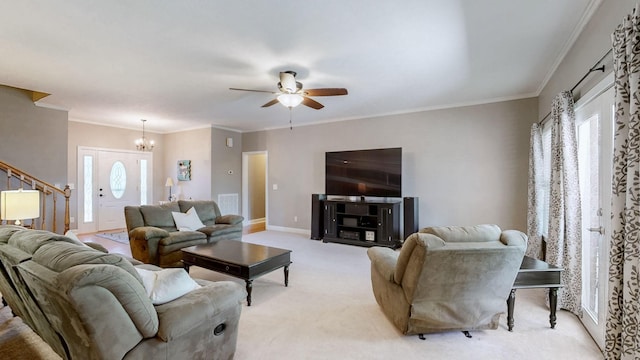 203 Ha Le Koa Ct, Smyrna, TN 37167 - living room with a ceiling fan, light colored carpet, a chandelier, crown molding, and baseboards