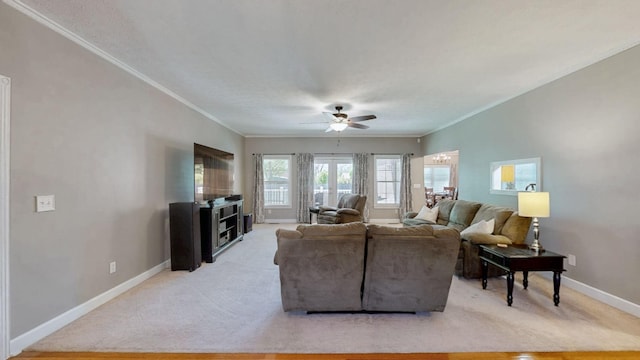 203 Ha Le Koa Ct, Smyrna, TN 37167 - living area with a ceiling fan, crown molding, baseboards, and light colored carpet