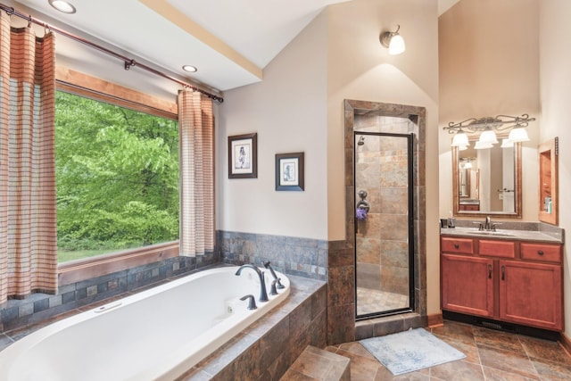 4455 Tarsus Rd, Palmyra, TN 37142 - bathroom featuring a stall shower, vanity, a bath, and vaulted ceiling