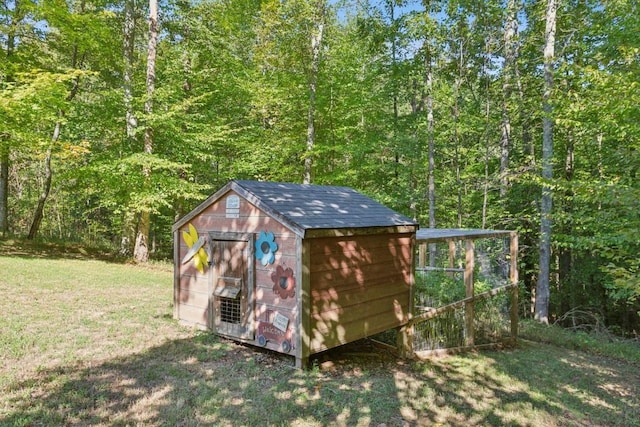 4455 Tarsus Rd, Palmyra, TN 37142 - view of shed with a forest view
