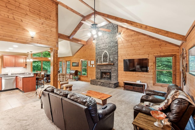 4455 Tarsus Rd, Palmyra, TN 37142 - living area with high vaulted ceiling, healthy amount of natural light, beamed ceiling, a ceiling fan, and wood walls