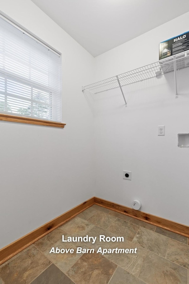 2385 Clear Brooks Dr, Signal Mountain, TN 37377 - laundry room featuring hookup for an electric dryer, baseboards, and stone finish floors