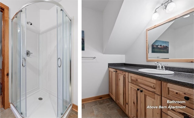 2385 Clear Brooks Dr, Signal Mountain, TN 37377 - full bathroom featuring baseboards, a stall shower, stone finish flooring, and vanity