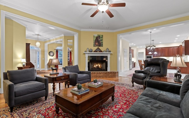 2385 Clear Brooks Dr, Signal Mountain, TN 37377 - living area featuring a ceiling fan, light wood-style flooring, a fireplace, ornamental molding, and recessed lighting