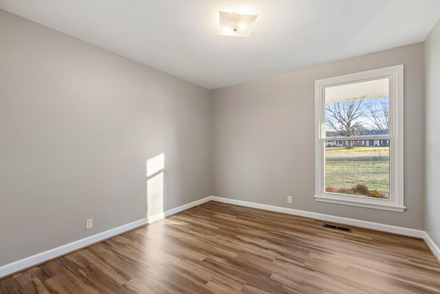 1107 Gardner Dr, Franklin, TN 37064 - empty room featuring wood finished floors and baseboards