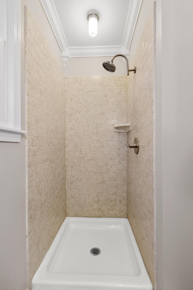 1107 Gardner Dr, Franklin, TN 37064 - full bathroom featuring crown molding and a tile shower