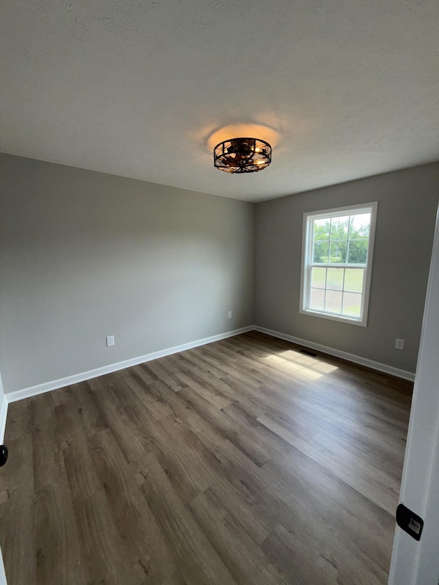 1331 Springplace Rd, Lewisburg, TN 37091 - unfurnished room with dark wood-type flooring and baseboards