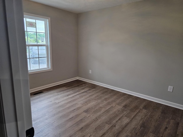 1331 Springplace Rd, Lewisburg, TN 37091 - empty room with dark wood-type flooring and baseboards